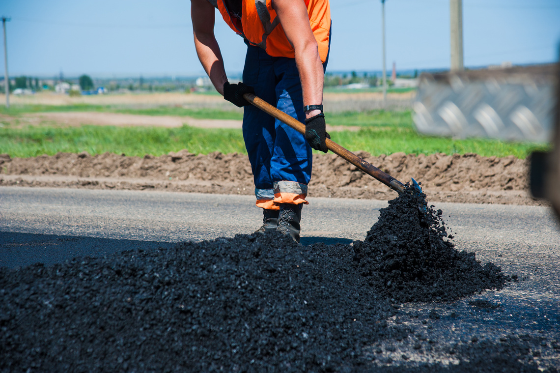 Workers on a road construction